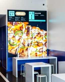 and Pizza - Kingstowne Center Alexandria VA interior solid surface tables